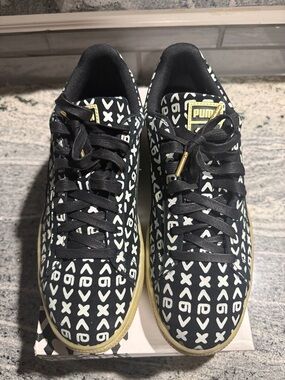PUMA “Zamunda” Black & White Patterned Sneakers with Gold Accents